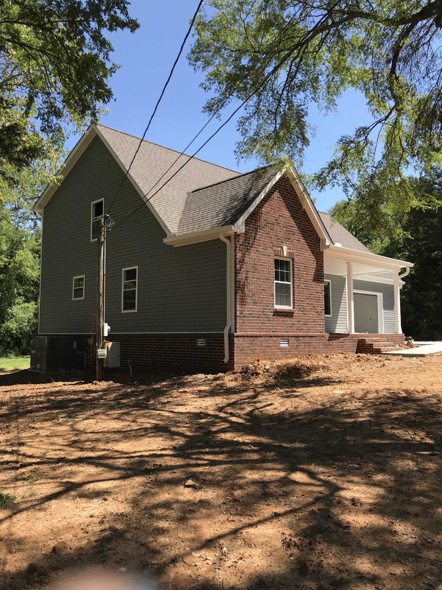 1141 Hamilton Chambers Road Lebanon, TN 37087 - Photo 6 of 15 a front view of a house with a yard