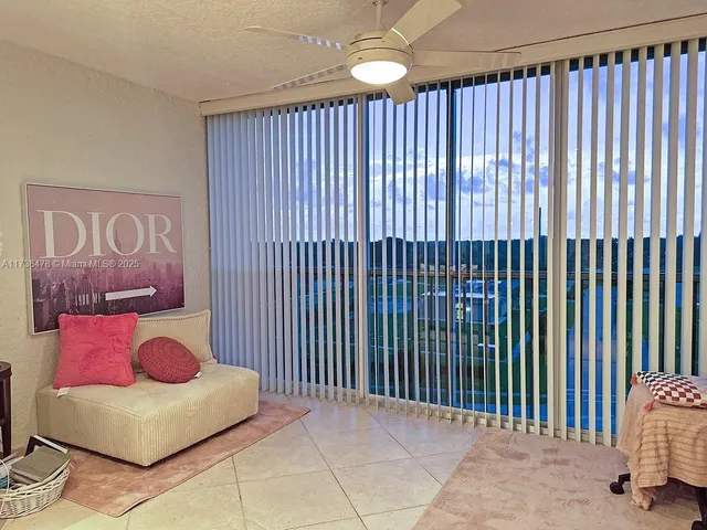 a view of a livingroom with furniture and furniture
