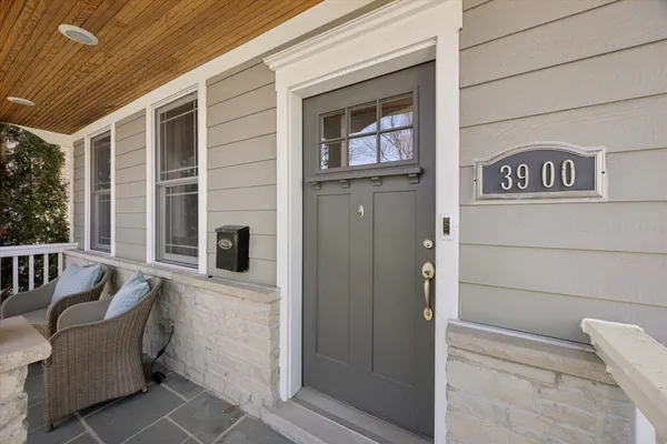 a view of a house with a door and windows