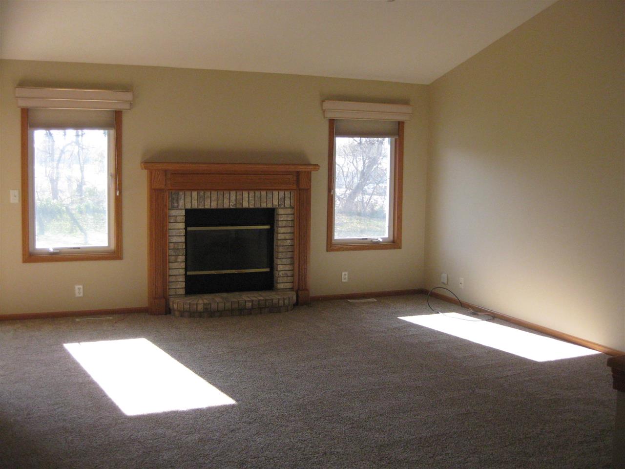 7017 Rye Ridge Trail Cherry Valley, IL 61016 - Photo 13 of 20 an empty room with windows