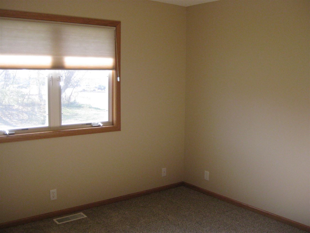 7017 Rye Ridge Trail Cherry Valley, IL 61016 - Photo 19 of 20 an empty room with a window
