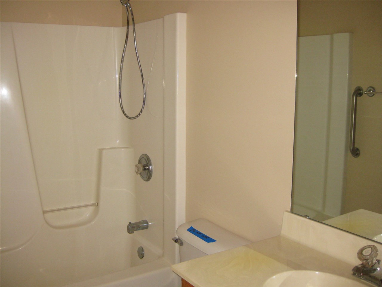 7017 Rye Ridge Trail Cherry Valley, IL 61016 - Photo 20 of 20 a bathroom with a bath tub with a shower