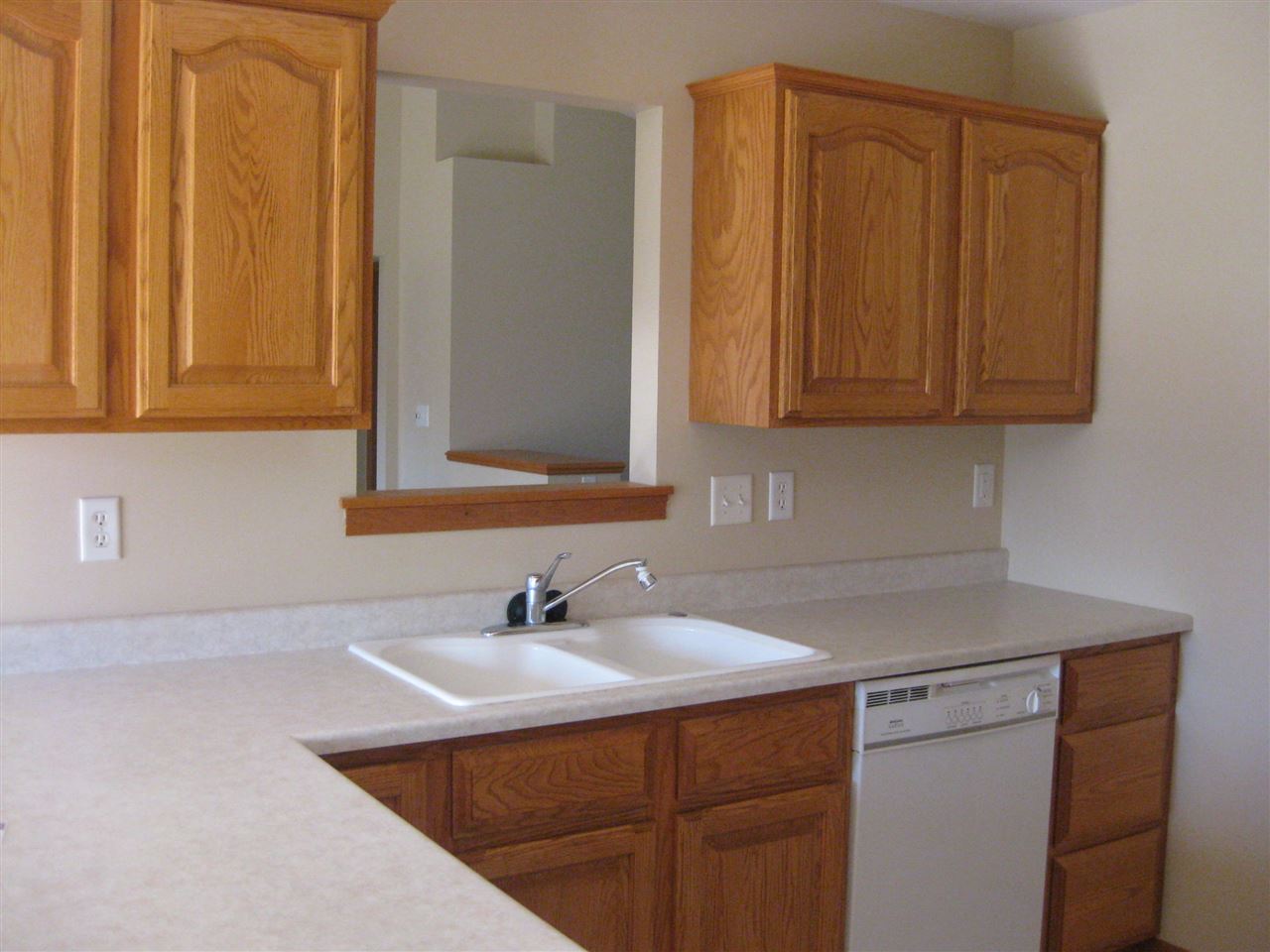 7017 Rye Ridge Trail Cherry Valley, IL 61016 - Photo 5 of 20 a bathroom with a sink and cabinets