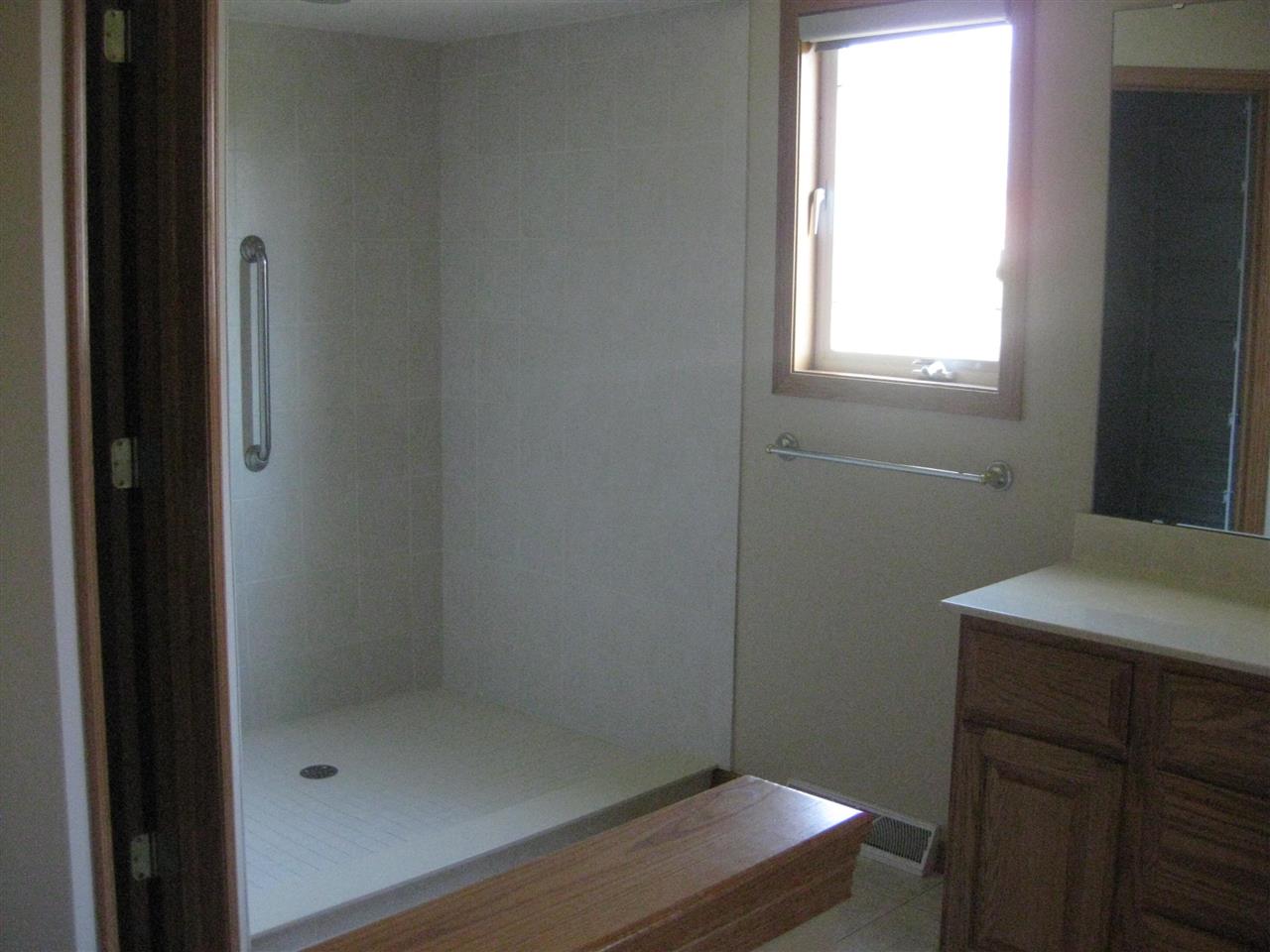 7017 Rye Ridge Trail Cherry Valley, IL 61016 - Photo 9 of 20 a bathroom with a shower