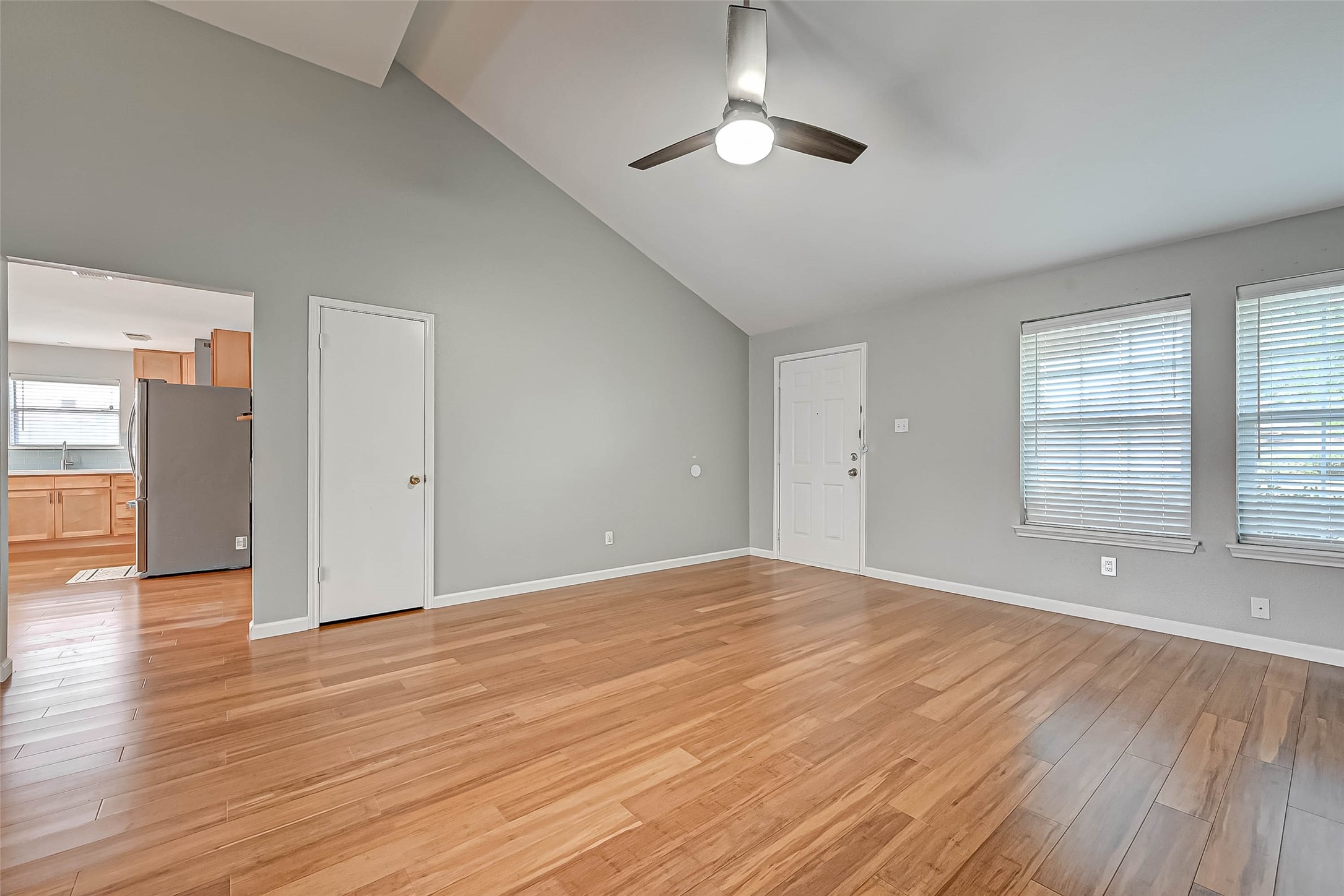 9466 Coast Bridge Street Houston, TX 77075 - Photo 4 of 29 wooden floor in an empty room with a window