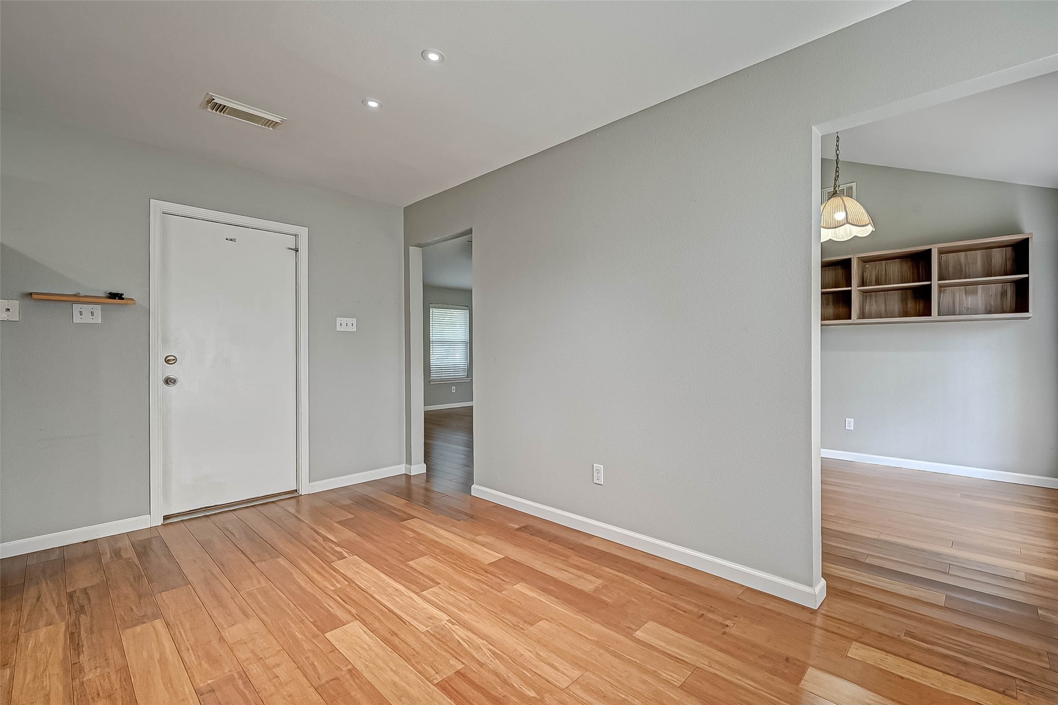9466 Coast Bridge Street Houston, TX 77075 - Photo 10 of 29 wooden floor in an empty room with a window