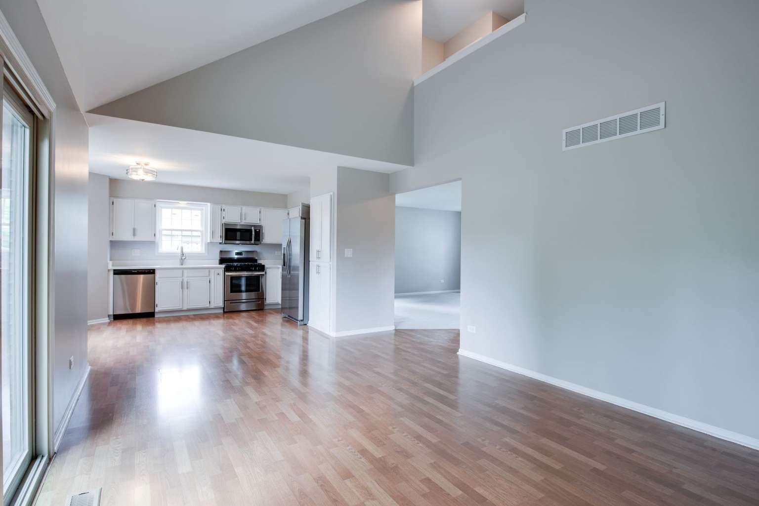 2203 Riverside Drive Plainfield, IL 60586 - Photo 12 of 25 a view of empty room with wooden floor