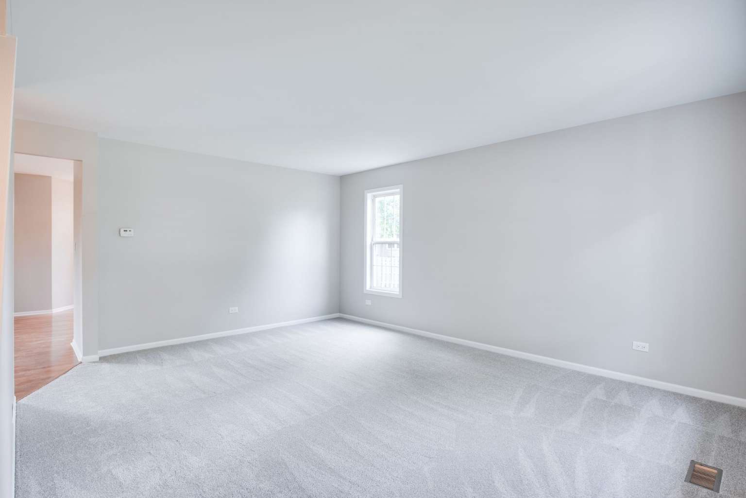 2203 Riverside Drive Plainfield, IL 60586 - Photo 23 of 25 a view of an empty room with a window