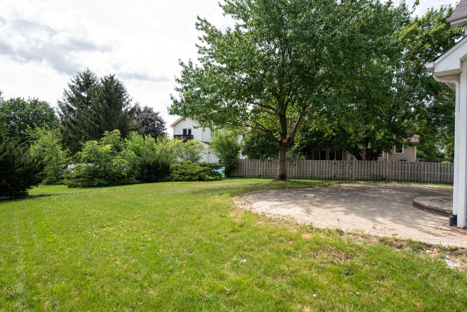 2203 Riverside Drive Plainfield, IL 60586 - Photo 24 of 25 a view of a yard with a tree