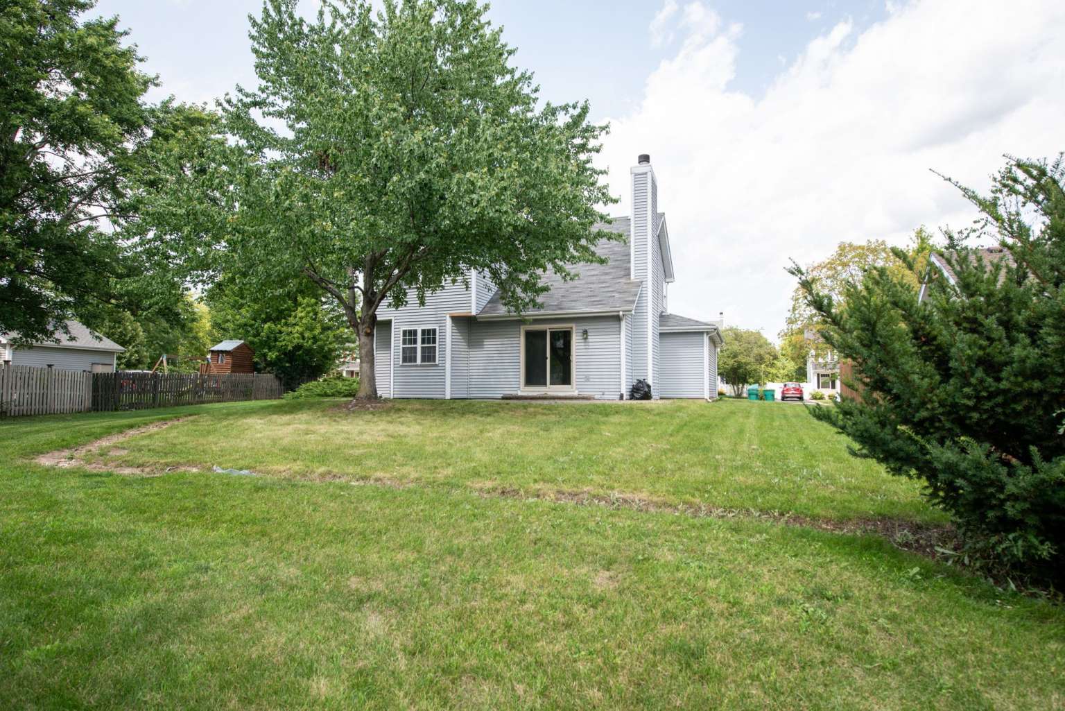 2203 Riverside Drive Plainfield, IL 60586 - Photo 25 of 25 a front view of house with yard and trees