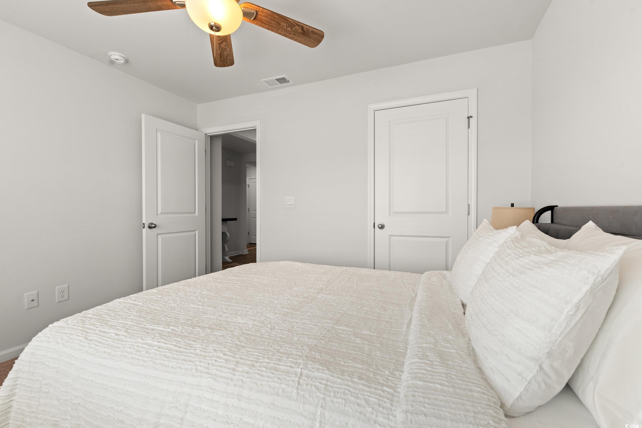 514 Strawberry Field Way Galivants Ferry, SC 29544 - Photo 17 of 37 Bedroom with ceiling fan and baseboards