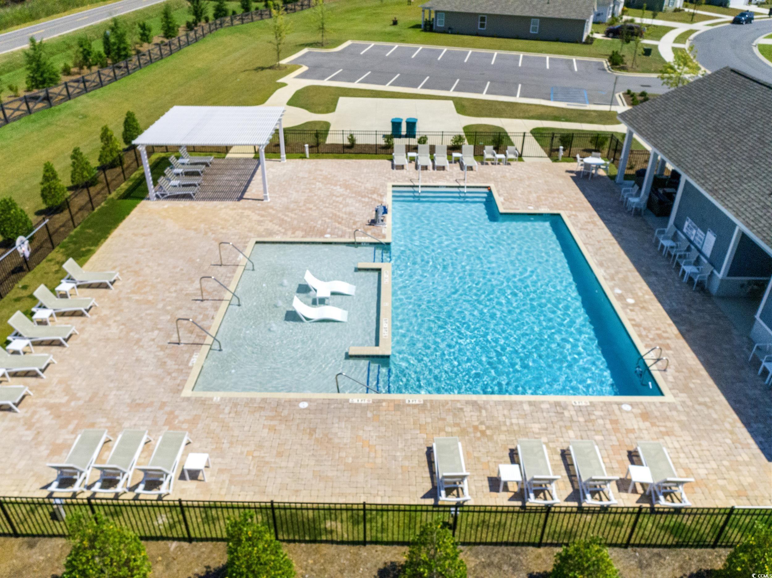 514 Strawberry Field Way Galivants Ferry, SC 29544 - Photo 32 of 37 Community pool with a patio area