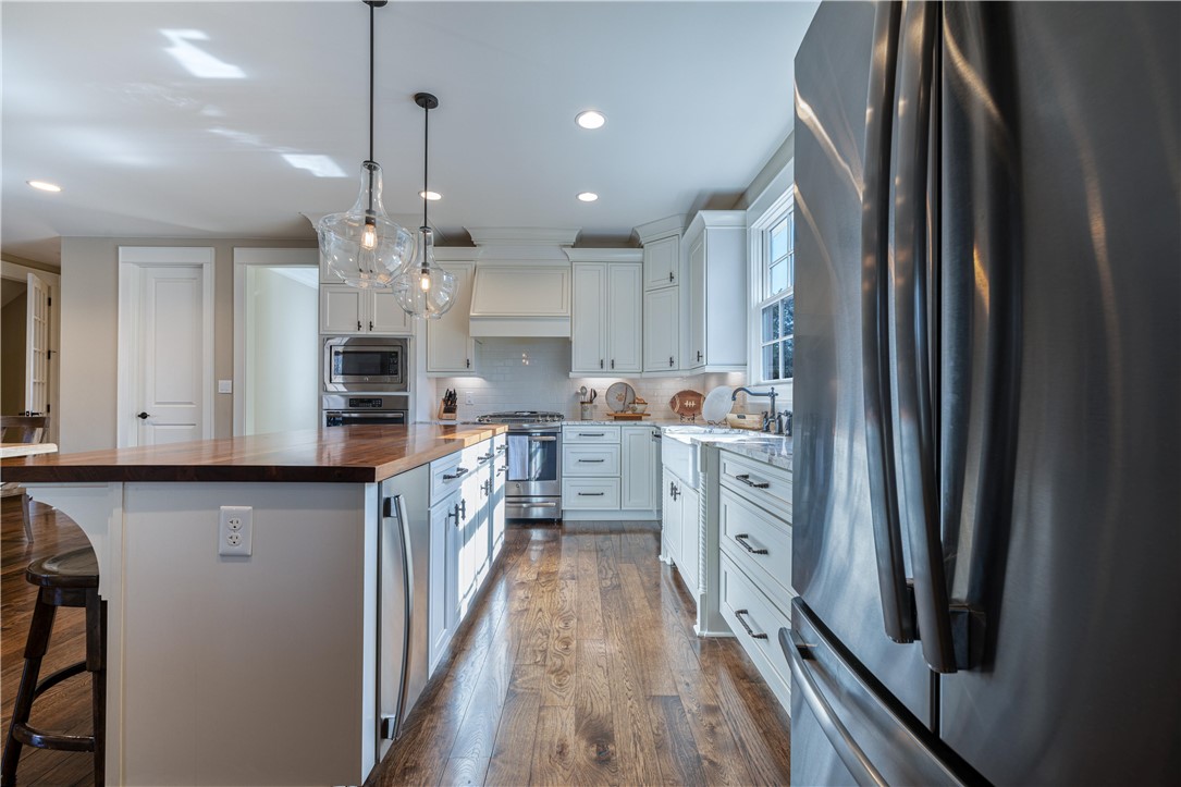 301 Stonebridge Drive Clemson, SC 29631 - Photo 14 of 47 This luminous kitchen features modern appliances and elegant design, perfect for culinary enthusiasts.