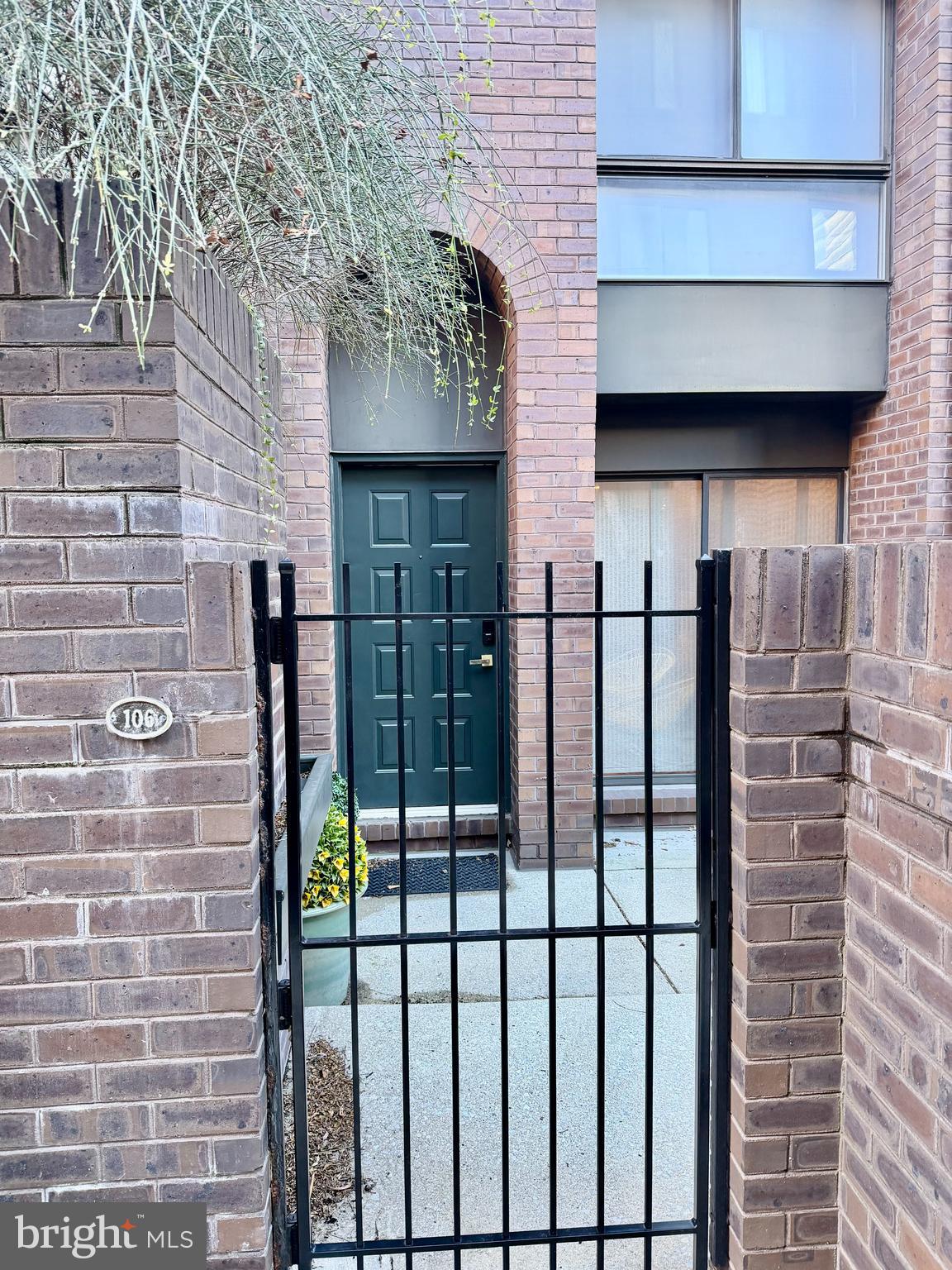 100 North 22nd Street, Unit 106 Philadelphia, PA 19103 - Photo 1 of 26 a view of a brick house with a small cabin
