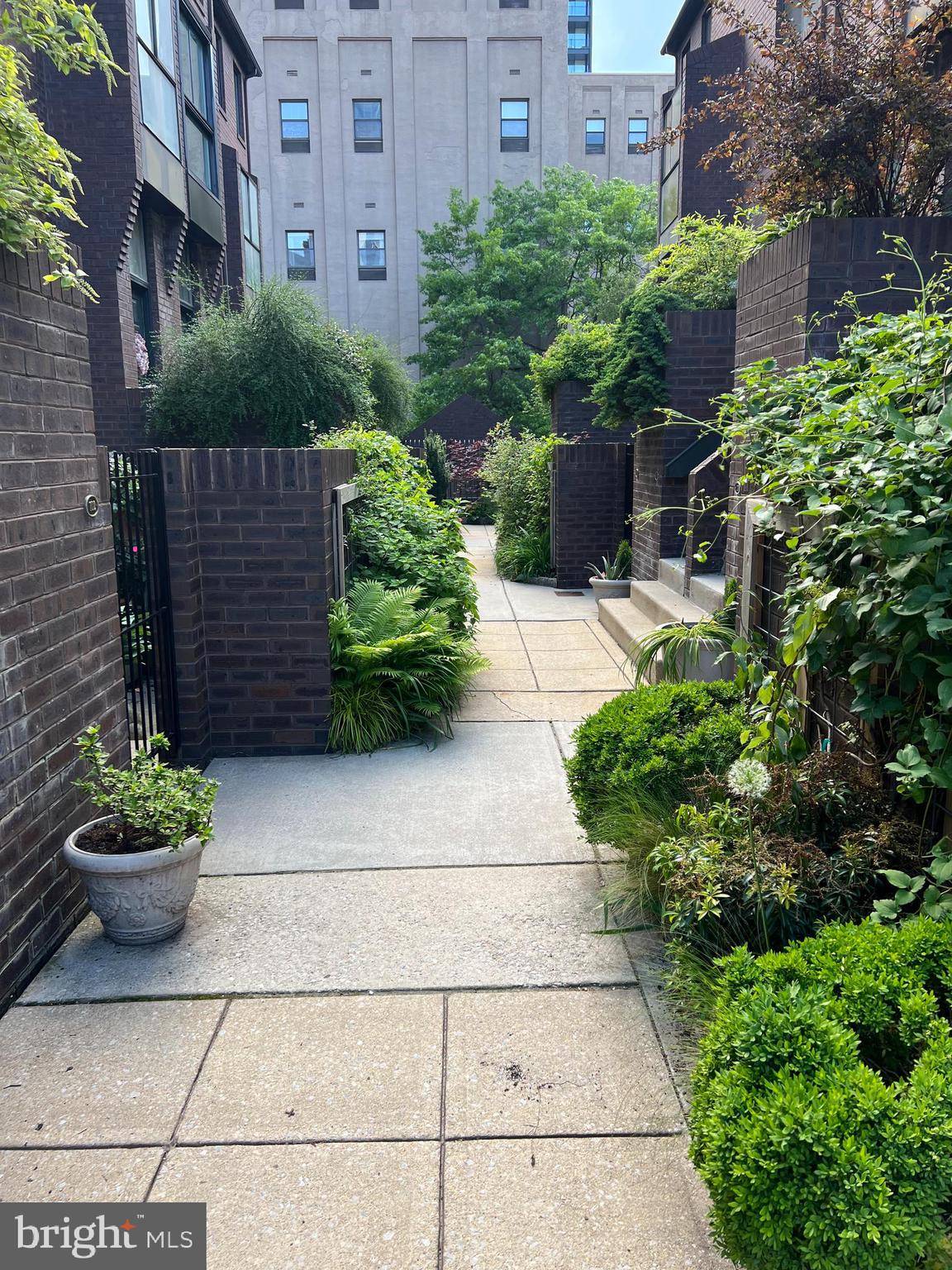 100 North 22nd Street, Unit 106 Philadelphia, PA 19103 - Photo 2 of 26 a view of a pathway with a house