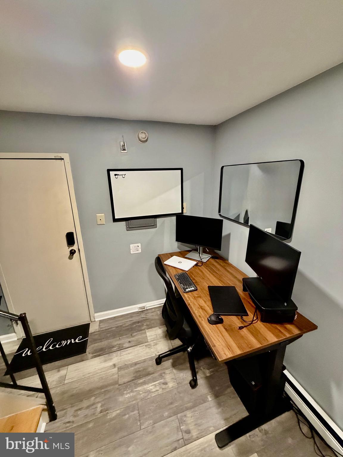 100 North 22nd Street, Unit 106 Philadelphia, PA 19103 - Photo 25 of 26 a room with furniture and window