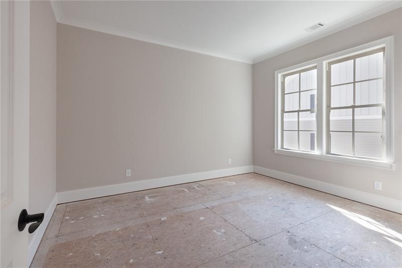 304 Trecastle Lane Canton, GA 30114 - Photo 14 of 31 an empty room with windows