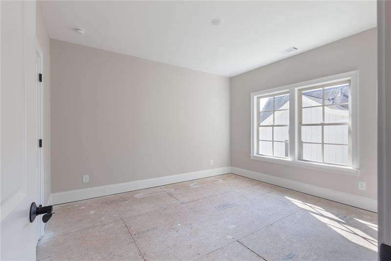 304 Trecastle Lane Canton, GA 30114 - Photo 28 of 31 an empty room with a window