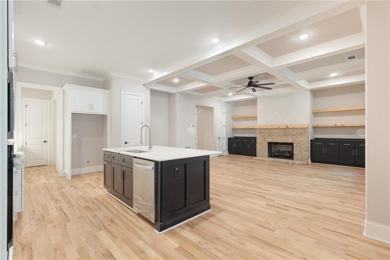 304 Trecastle Lane Canton, GA 30114 - Photo 9 of 31 a kitchen with stainless steel appliances granite countertop a wooden cabinets and a sink