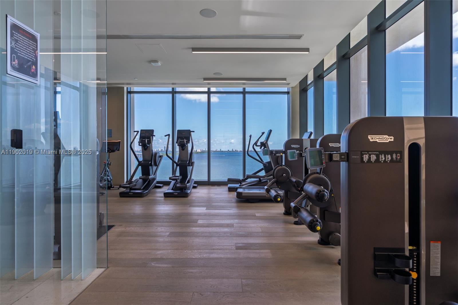 3131 Northeast 7th Avenue, Unit 2202 Miami, FL 33137 - Photo 32 of 68 a view of a room with gym equipment