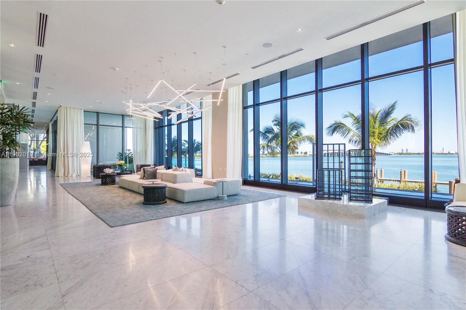 3131 Northeast 7th Avenue, Unit 2202 Miami, FL 33137 - Photo 44 of 68 a view of a livingroom with furniture and a large window