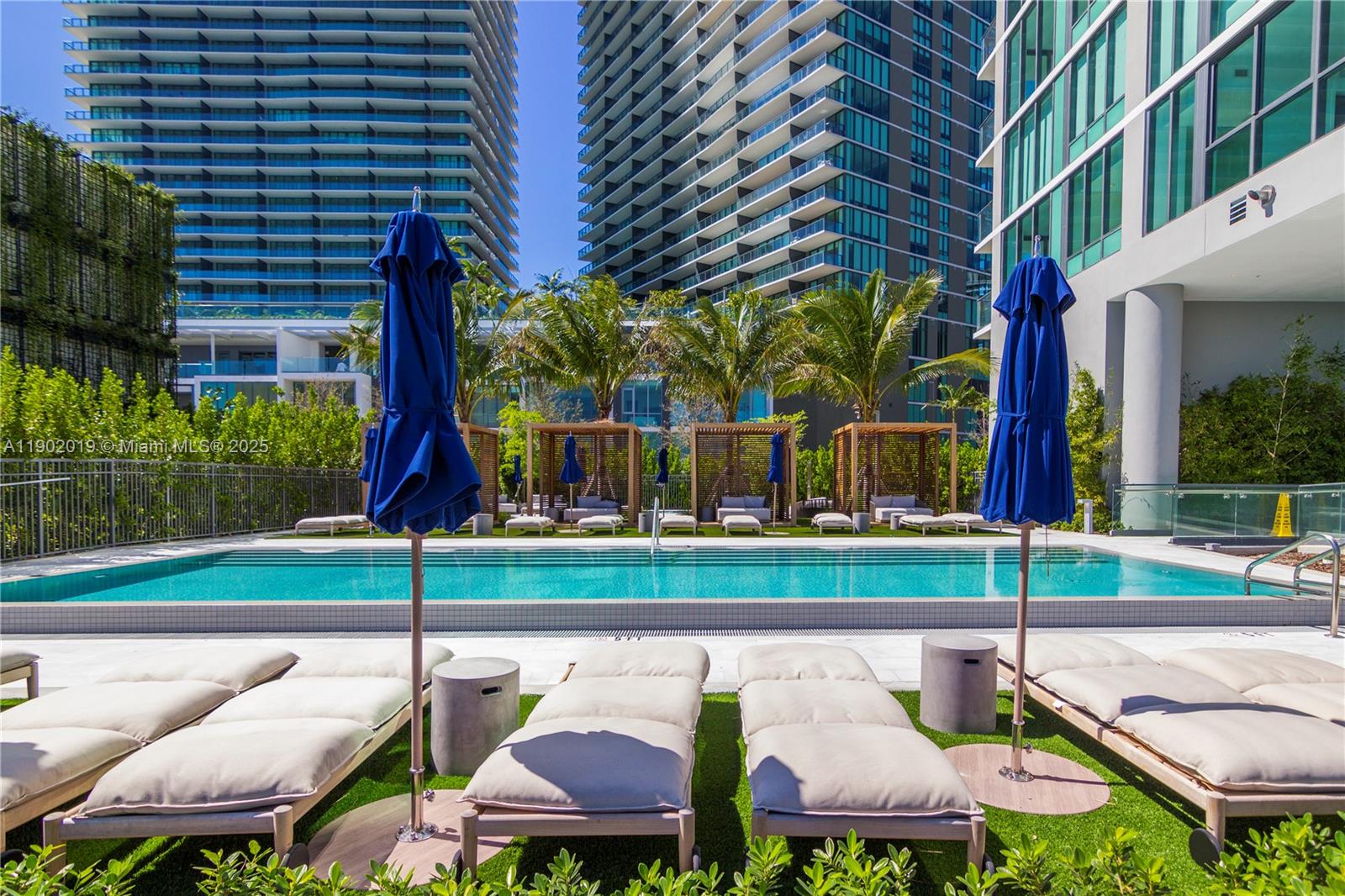 3131 Northeast 7th Avenue, Unit 2202 Miami, FL 33137 - Photo 50 of 68 Ground-floor pool & cabanas overlooking Biscayne Bay