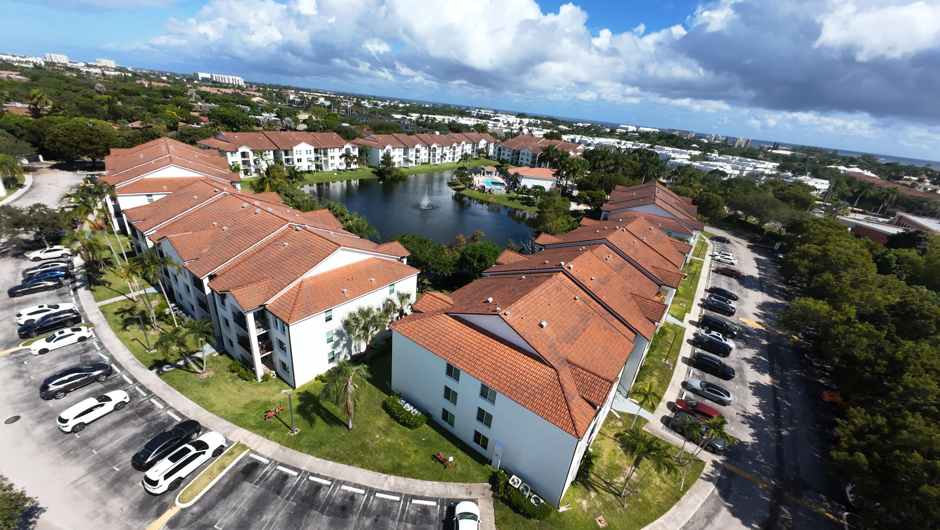 401 Villa Circle Boynton Beach, FL 33435 - Photo 38 of 58 Mirabella Villas drone-all buildings wat