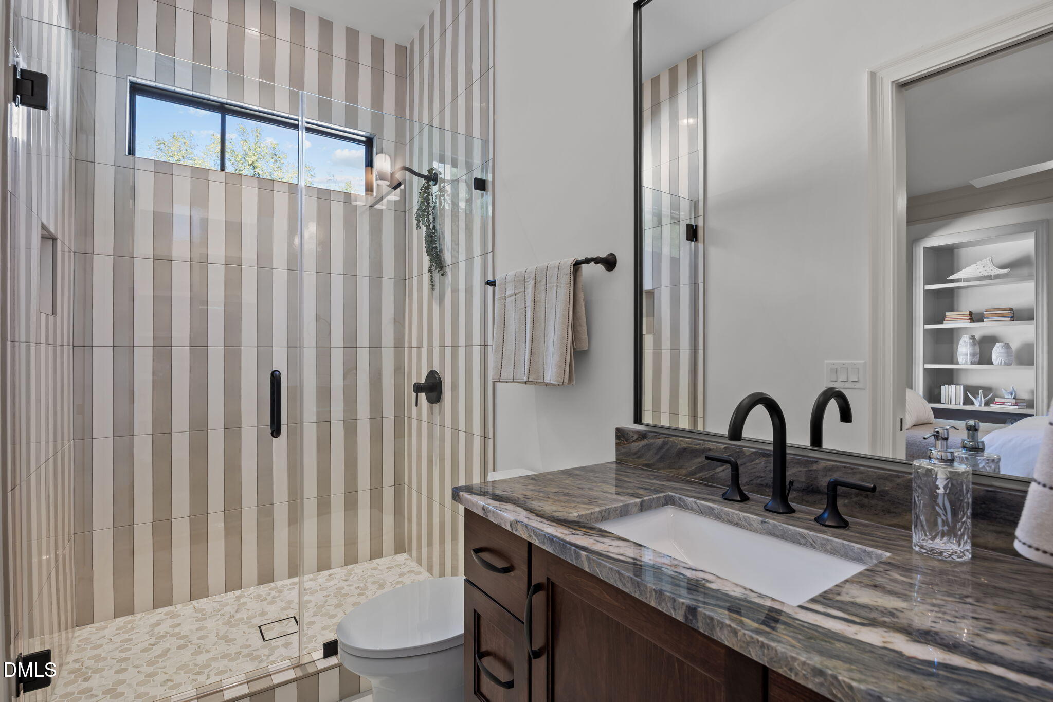 2733 Rothgeb Drive Raleigh, NC 27609 - Photo 13 of 63 a bathroom with a granite countertop sink toilet and shower