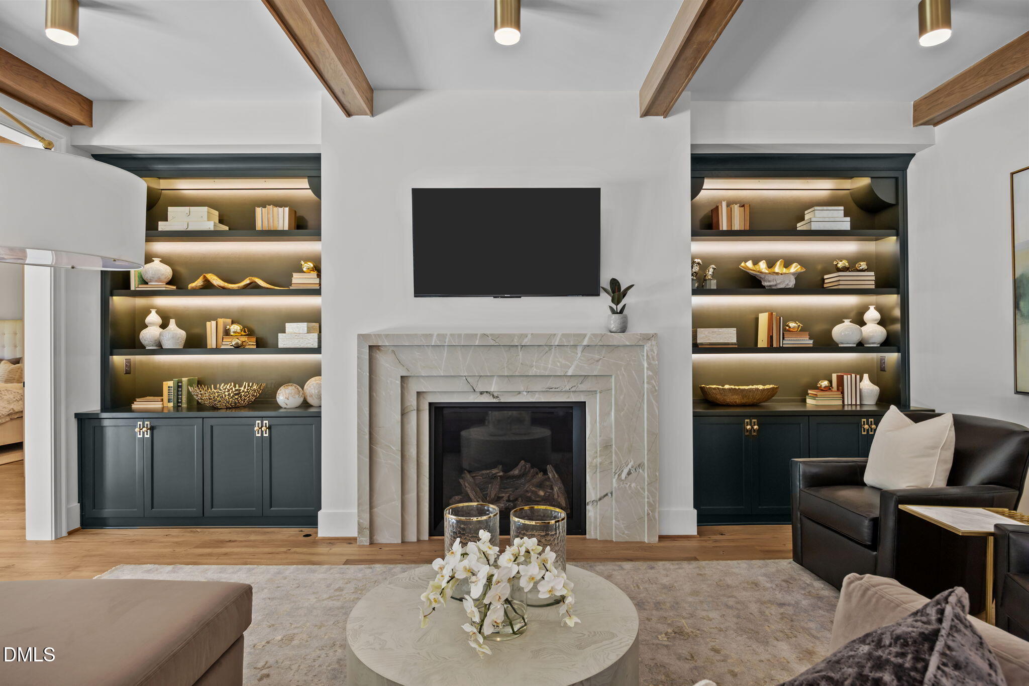 2733 Rothgeb Drive Raleigh, NC 27609 - Photo 25 of 63 a living room with furniture and a fireplace