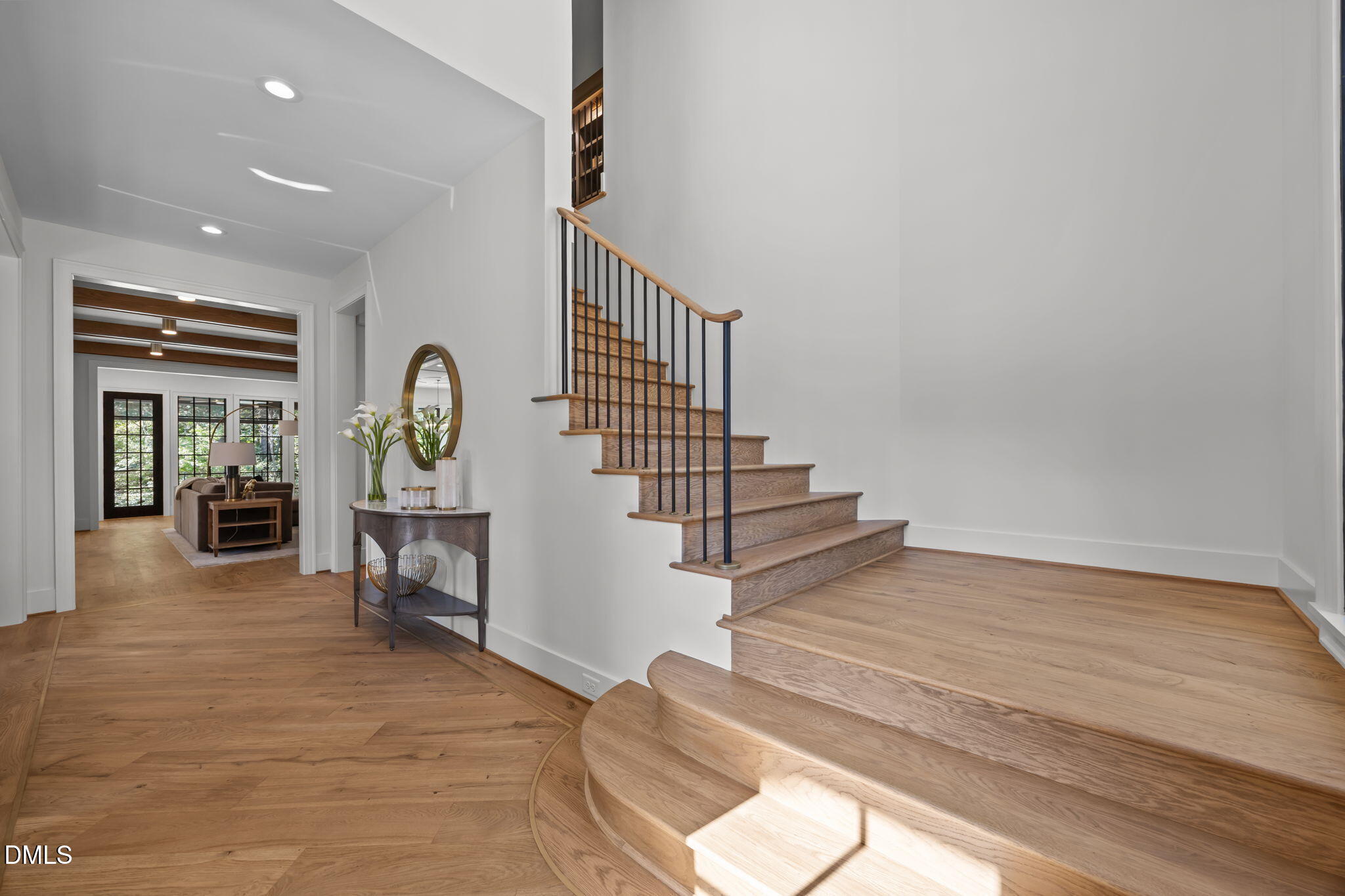2733 Rothgeb Drive Raleigh, NC 27609 - Photo 5 of 63 a view of entryway and hall with wooden floor