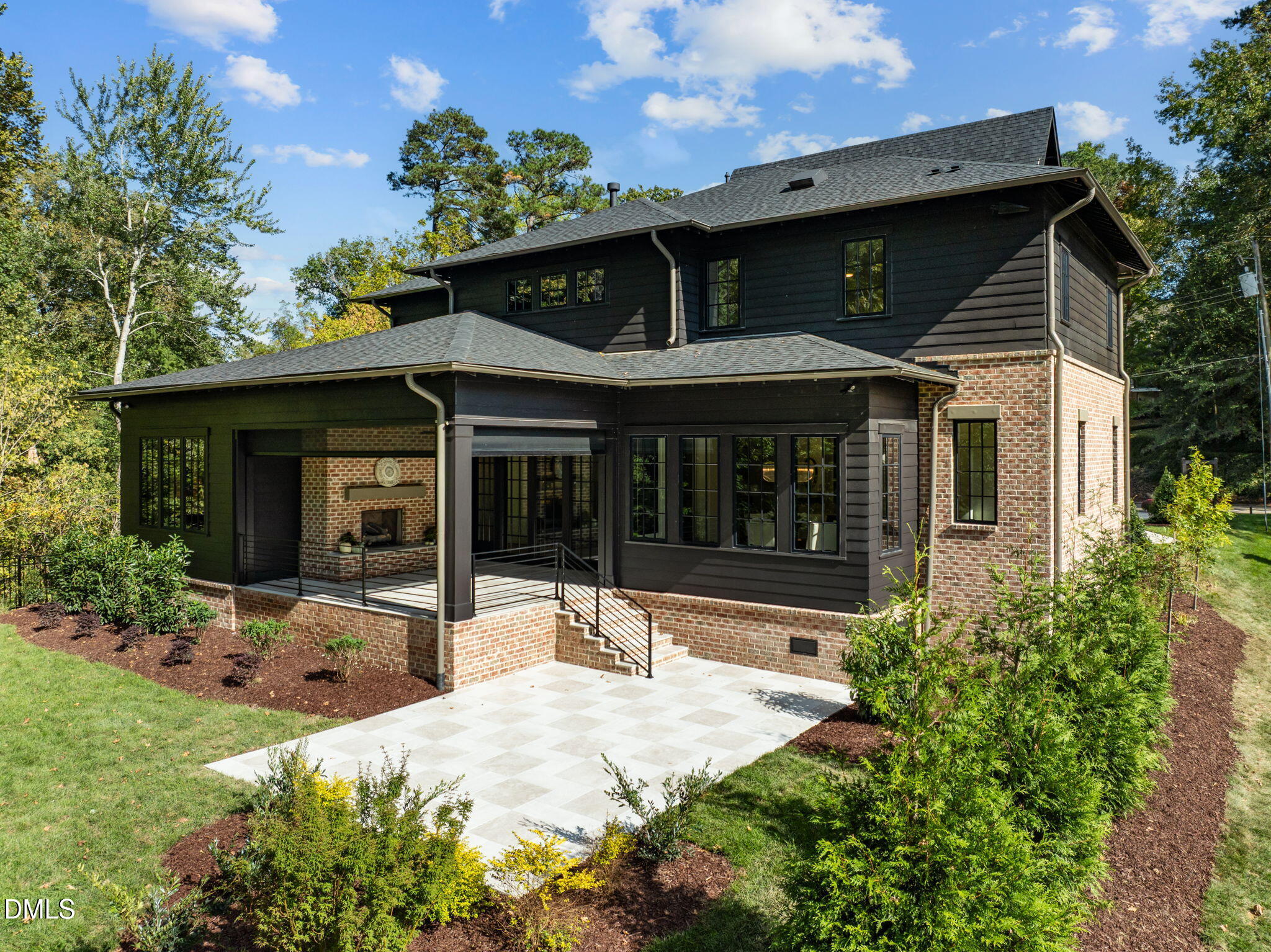 2733 Rothgeb Drive Raleigh, NC 27609 - Photo 58 of 63 a front view of a house with a garden