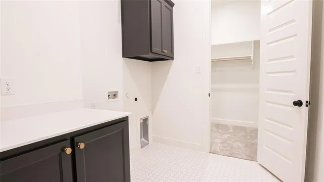 a bathroom with a bathtub sink and mirror