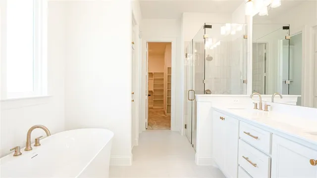 an empty room with a fireplace and fan