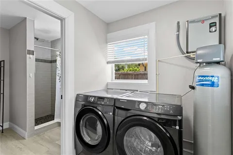 a utility room with dryer and washer