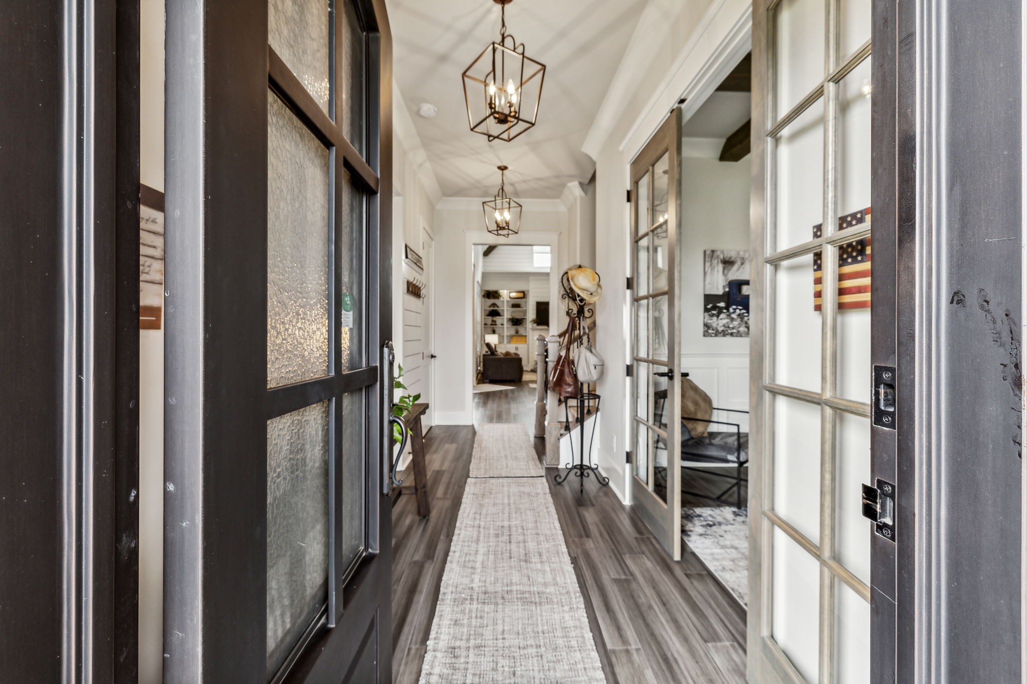 2054 Autumn Ridge Way Spring Hill, TN 37174 - Photo 6 of 50 a view of a hallway with wooden floor and staircase