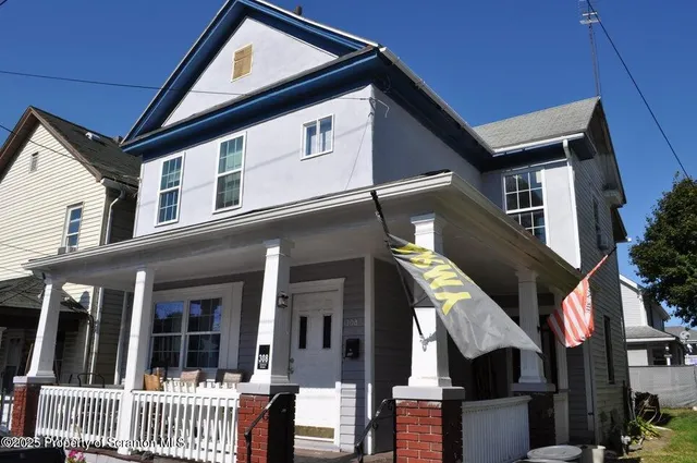 a front view of a house with balcony