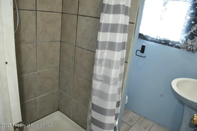 a bathroom with a shower