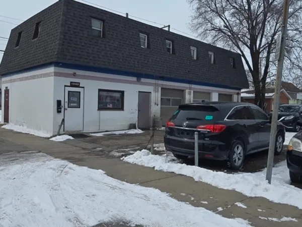 a car parked in front of a house