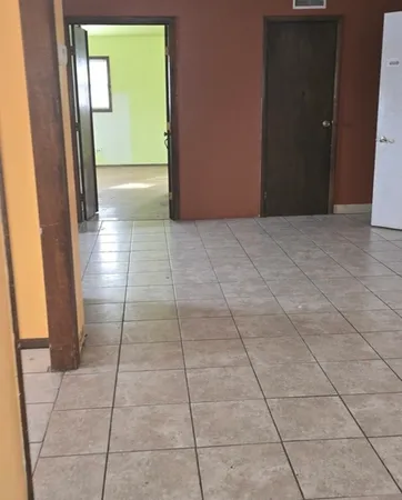 an empty room with windows