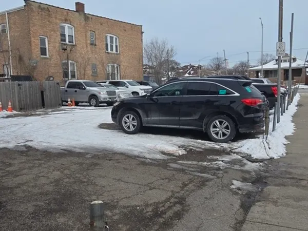 a stove top oven sitting inside of a kitchen