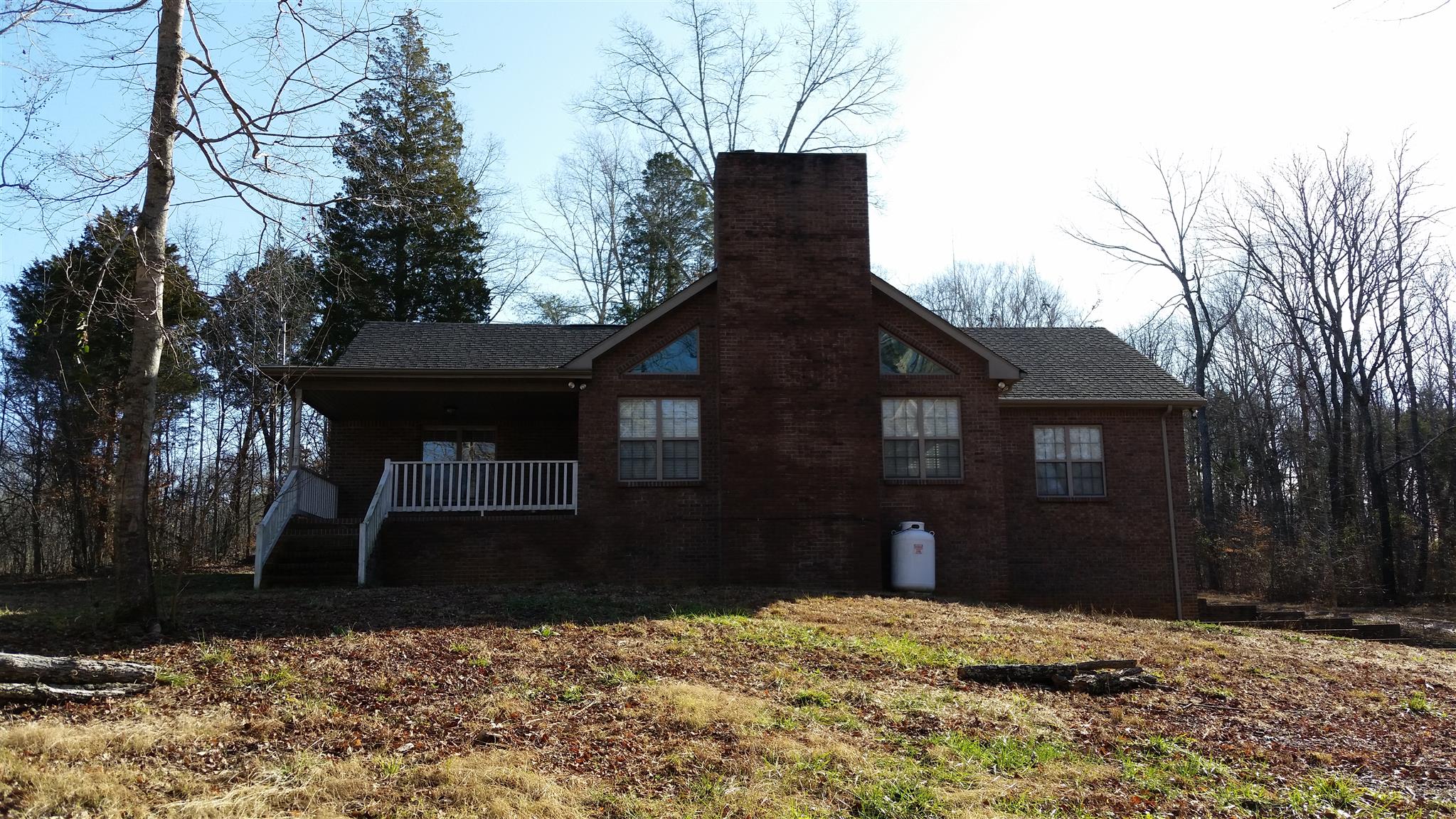 3055 Sweethome Road Chapmansboro, TN 37035 - Photo 1 of 19 Custom built home setting on top of 7 acres
