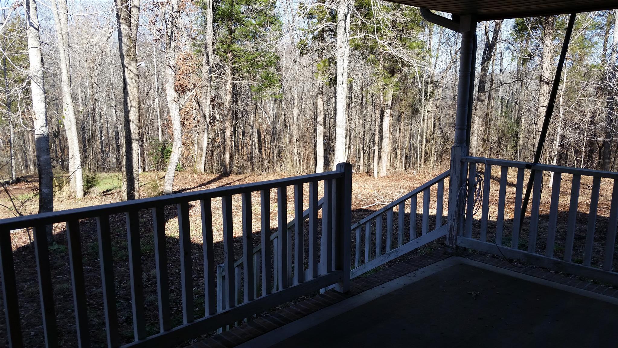 3055 Sweethome Road Chapmansboro, TN 37035 - Photo 16 of 19 Covered front porch with treed lot.