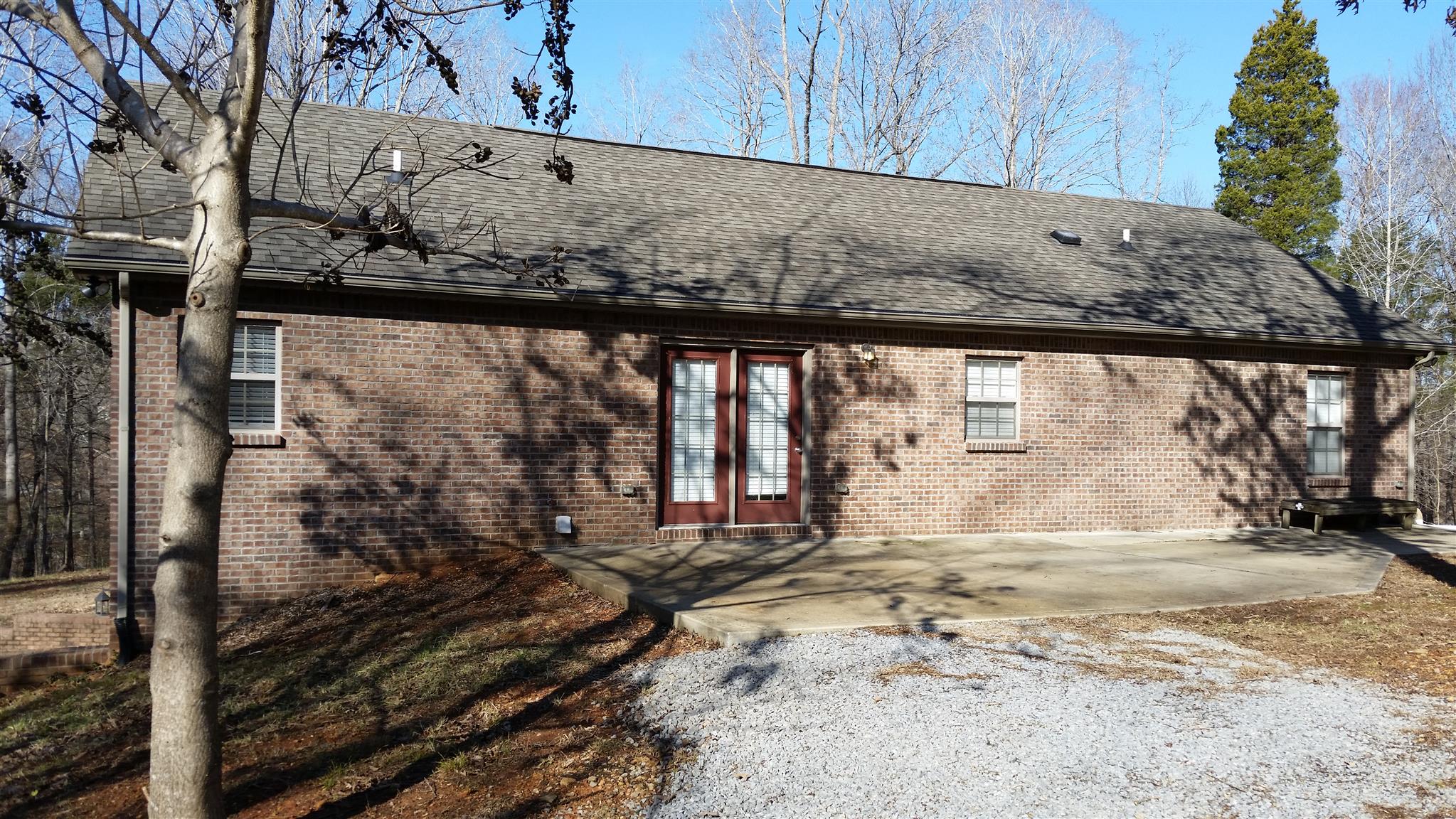 3055 Sweethome Road Chapmansboro, TN 37035 - Photo 18 of 19 Back entrance with concrete patio