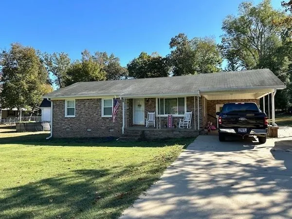 a view of a house with a patio