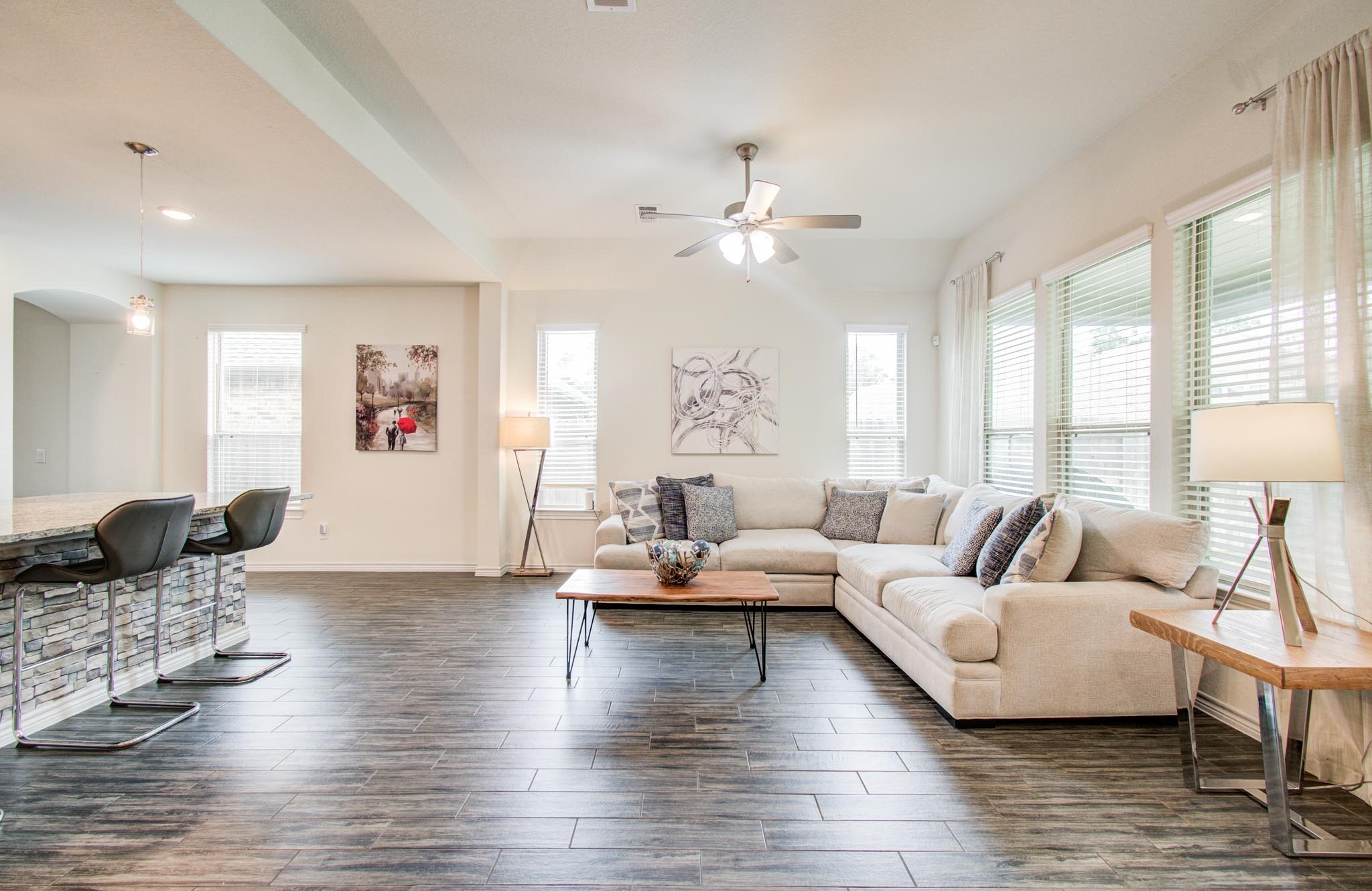 27817 Ellie Oak Lane Spring, TX 77386 - Photo 21 of 49 a living room with furniture wooden floor and a chandelier