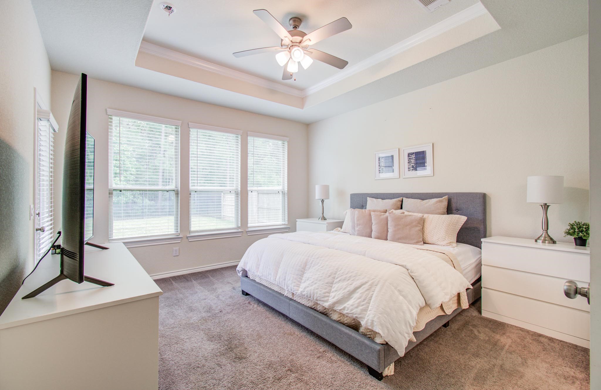 27817 Ellie Oak Lane Spring, TX 77386 - Photo 22 of 49 a spacious bedroom with a bed and a large window