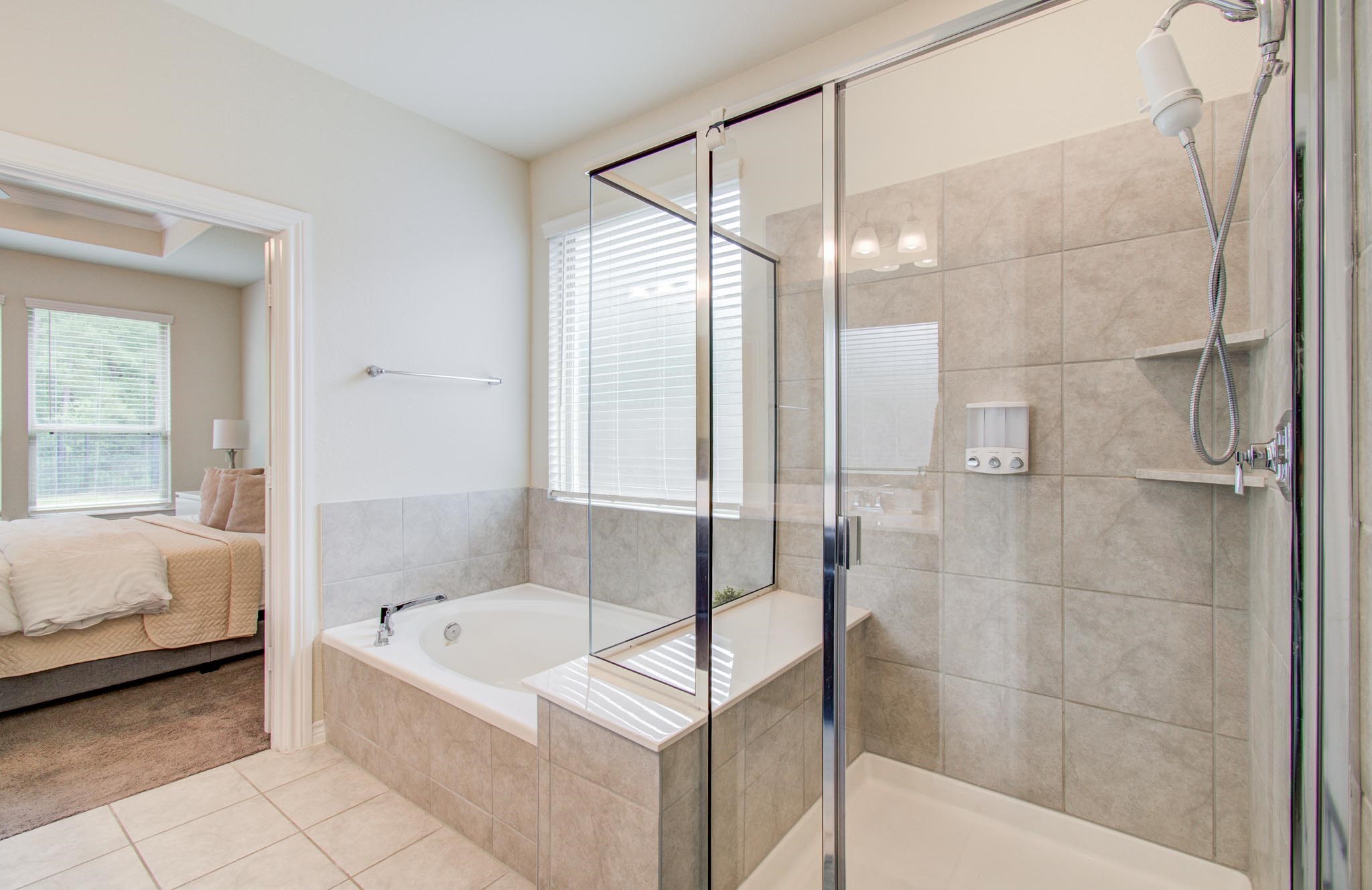 27817 Ellie Oak Lane Spring, TX 77386 - Photo 27 of 49 a bathroom with a tub and a shower
