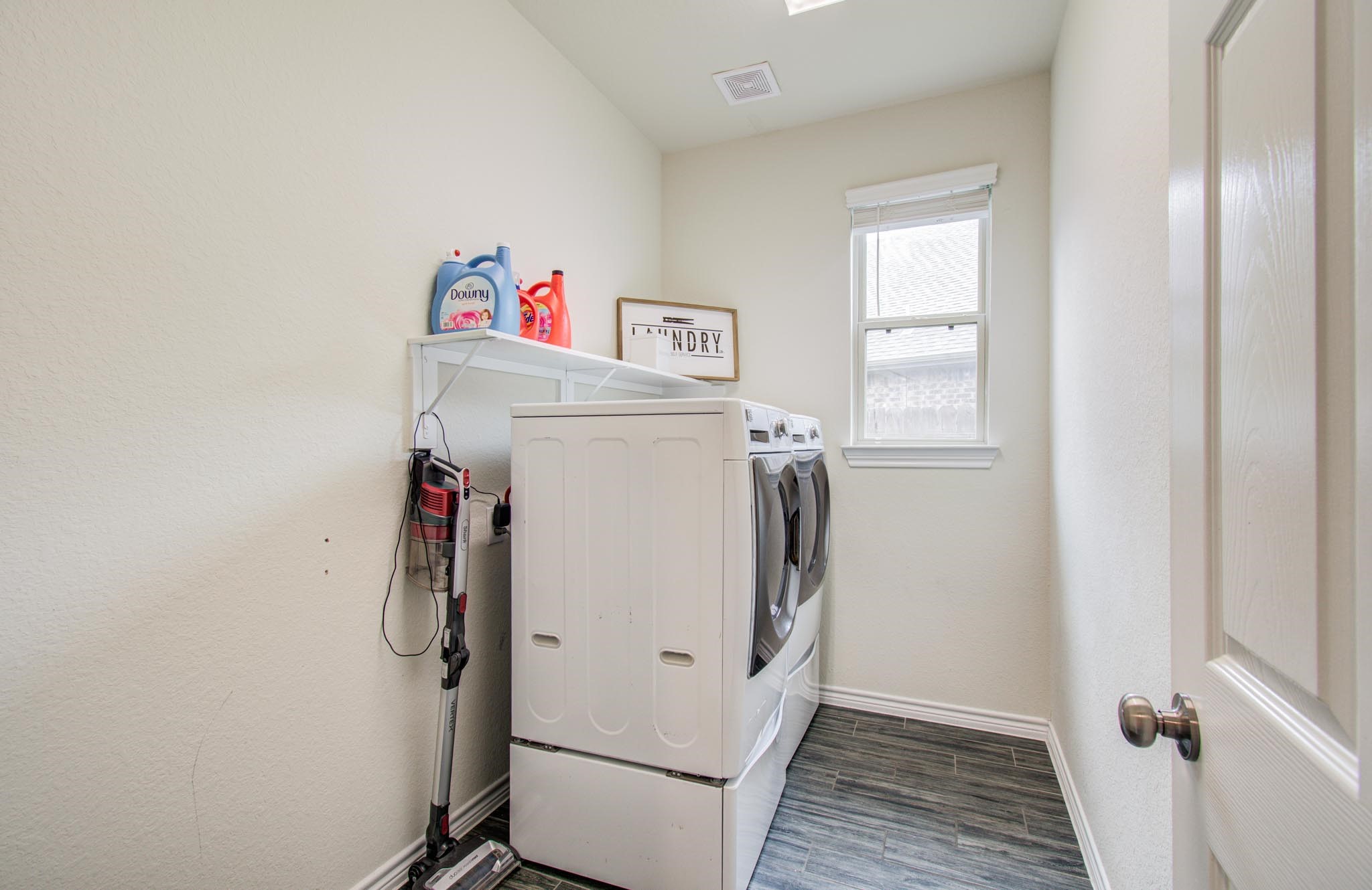 27817 Ellie Oak Lane Spring, TX 77386 - Photo 28 of 49 a utility room with dryer and washer