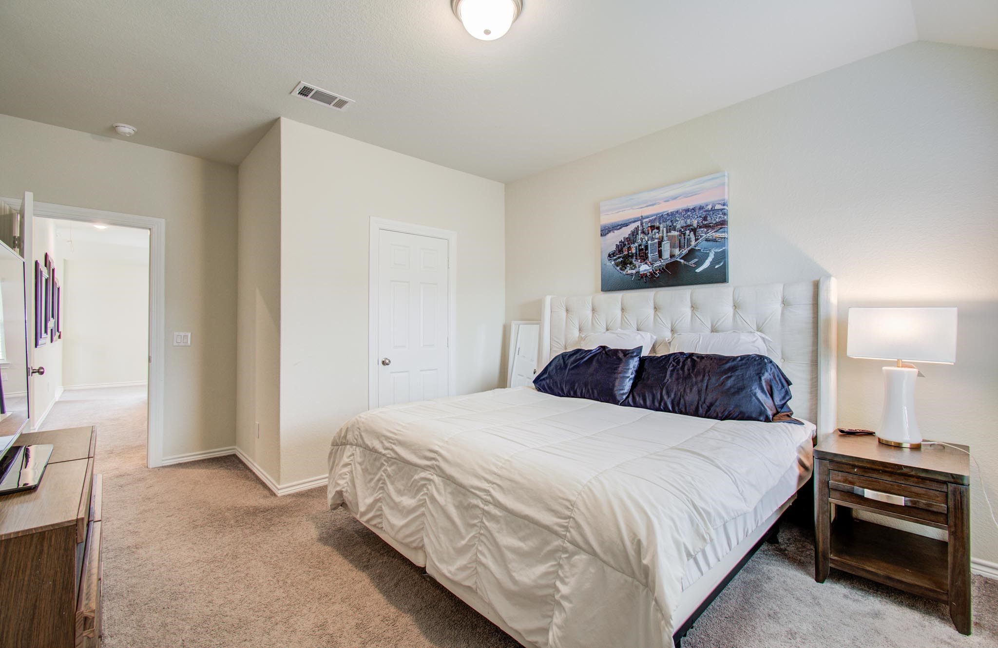 27817 Ellie Oak Lane Spring, TX 77386 - Photo 39 of 49 a bedroom with a bed and a view of kitchen