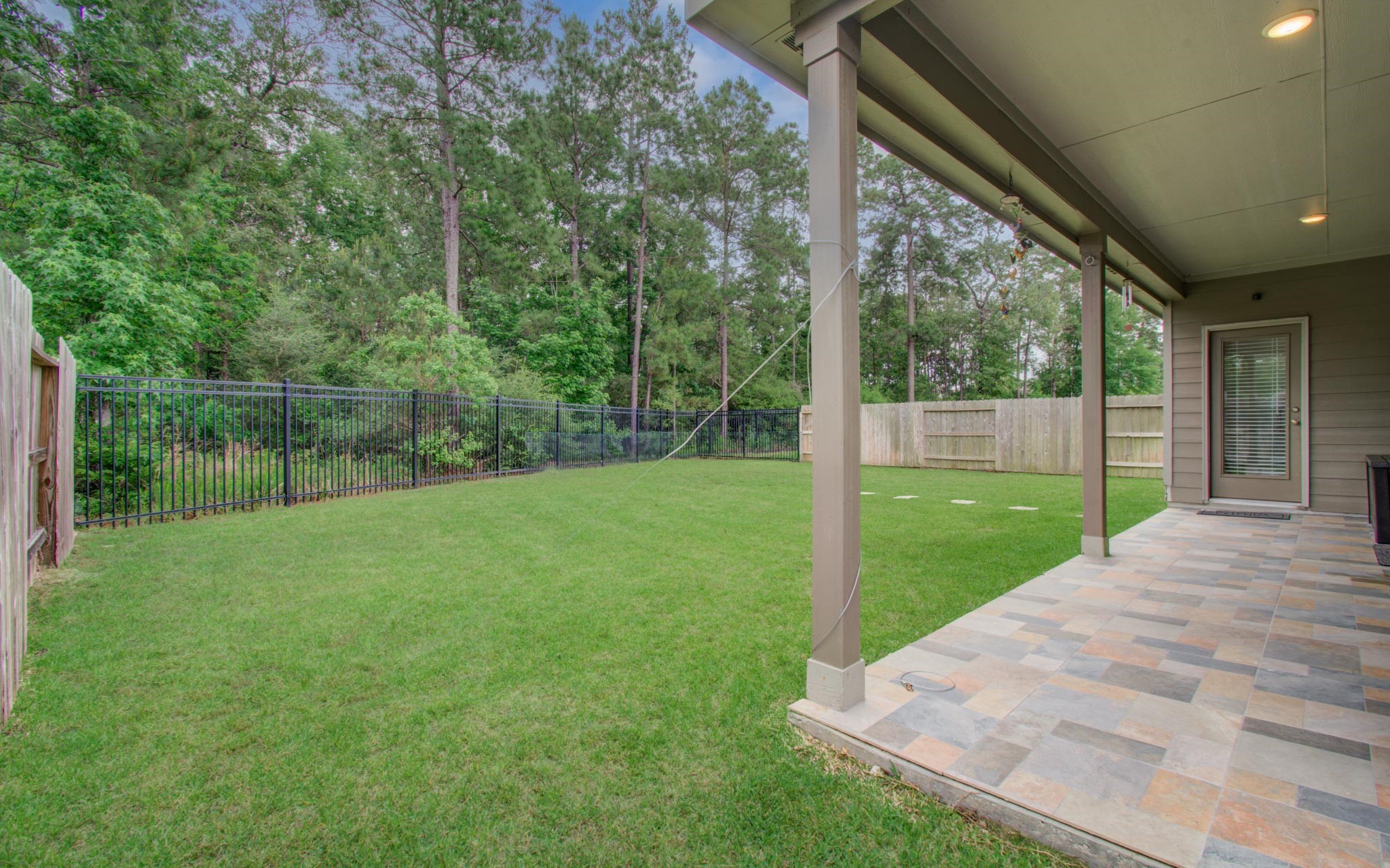 27817 Ellie Oak Lane Spring, TX 77386 - Photo 41 of 49 a view of a backyard with a garden